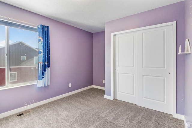 834 W Shelton Way, Midvale, UT 84047 - unfurnished bedroom with carpet floors, a closet, and baseboards