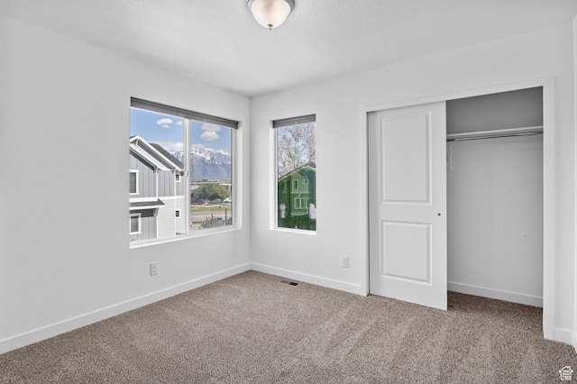 834 W Shelton Way, Midvale, UT 84047 - unfurnished bedroom with carpet flooring, a closet, and baseboards