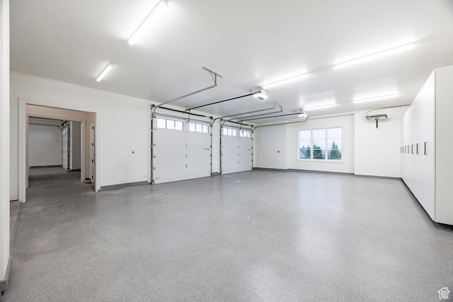 garage featuring baseboards