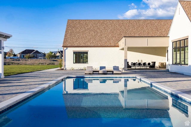 swimming pool with a patio