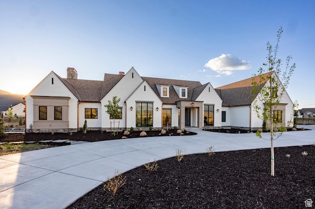 618 S Fox Den Rd Unit 2, Midway, UT 84049 - view of front of house featuring a chimney and a shingled roof