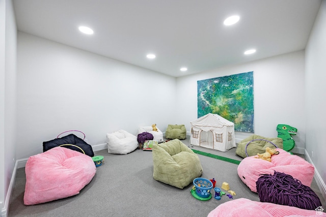 rec room with carpet floors, recessed lighting, and baseboards