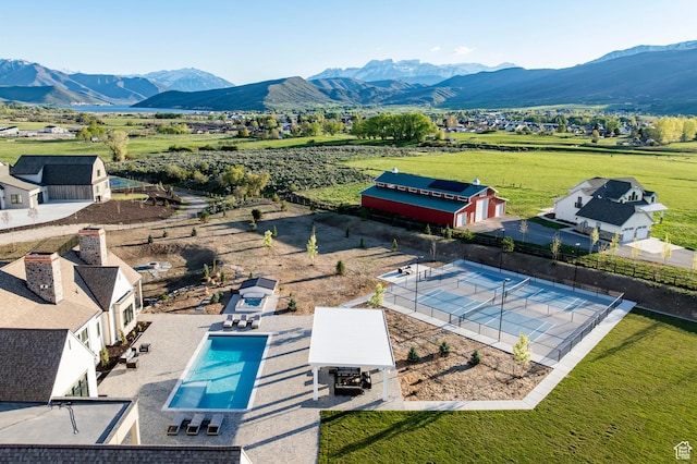 overview of rural landscape with a mountain backdrop
