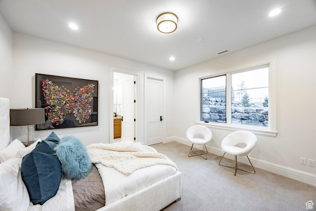 bedroom with baseboards, carpet flooring, recessed lighting, and connected bathroom