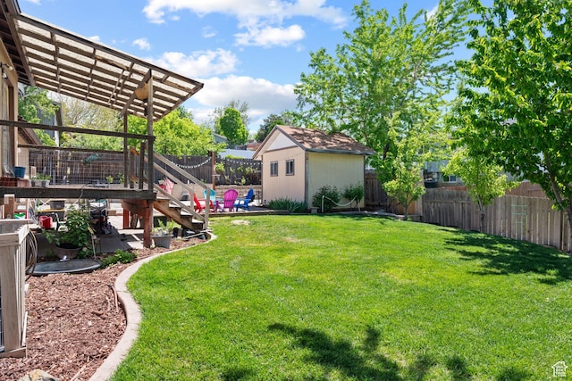 view of yard featuring an outdoor structure and a patio