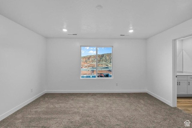 1448 S Staircase Way Unit 4099, Washington, UT 84780 - empty room with light carpet, recessed lighting, and baseboards