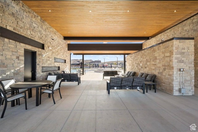 1448 S Staircase Way Unit 4099, Washington, UT 84780 - view of patio with an outdoor living space with a fireplace and outdoor dining area