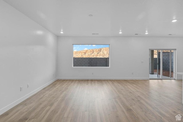 1448 S Staircase Way Unit 4099, Washington, UT 84780 - empty room with light wood finished floors, recessed lighting, and baseboards