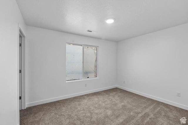 1448 S Staircase Way Unit 4099, Washington, UT 84780 - unfurnished room featuring carpet flooring, baseboards, and a textured ceiling