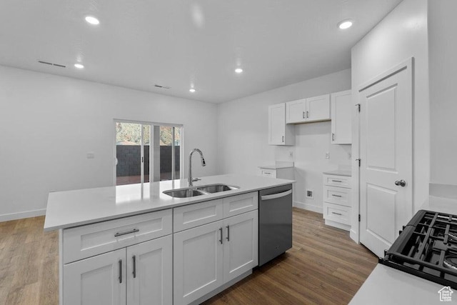 1448 S Staircase Way Unit 4099, Washington, UT 84780 - kitchen featuring a sink, stainless steel dishwasher, white cabinetry, wood finished floors, and recessed lighting