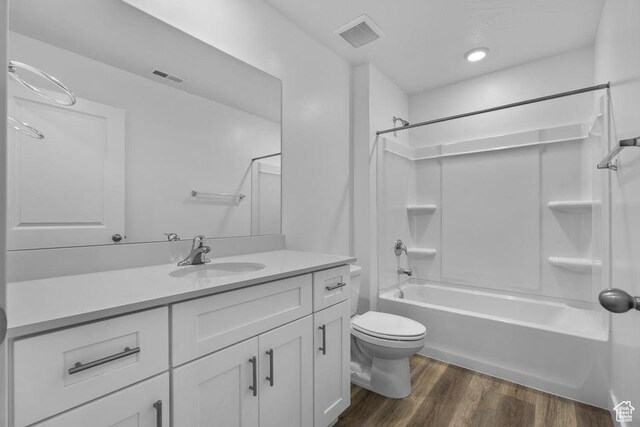 1448 S Staircase Way Unit 4099, Washington, UT 84780 - bathroom featuring toilet, wood finished floors, vanity, and shower / bath combination
