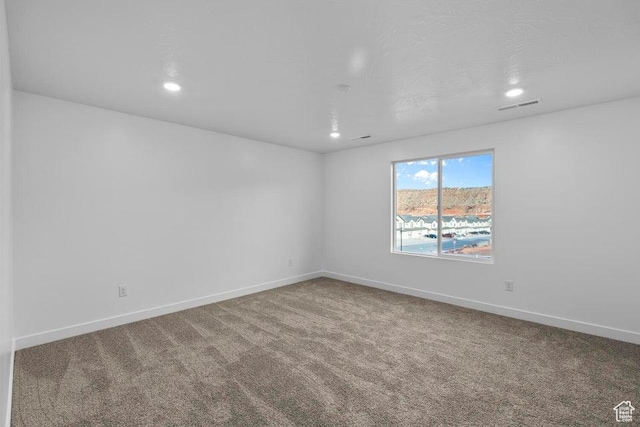 1448 S Staircase Way Unit 4099, Washington, UT 84780 - empty room with carpet, baseboards, and recessed lighting
