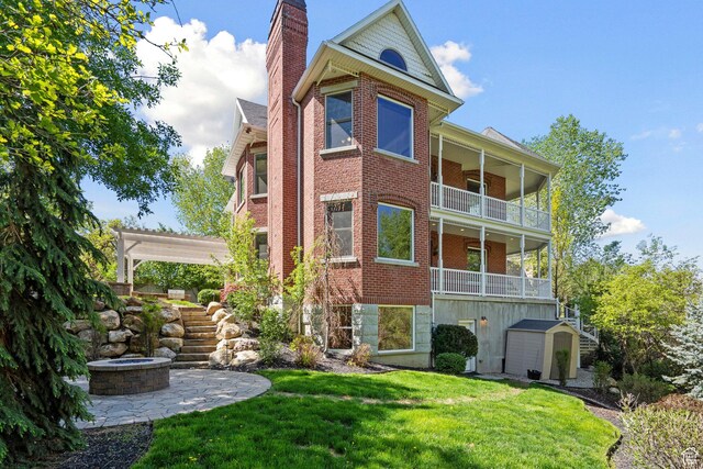 view of building exterior with a fire pit