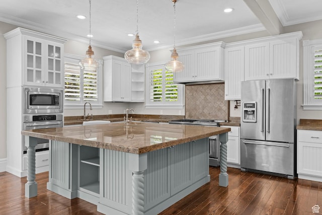 kitchen featuring appliances with stainless steel finishes, open shelves, a sink, dark wood-type flooring, and ornamental molding
