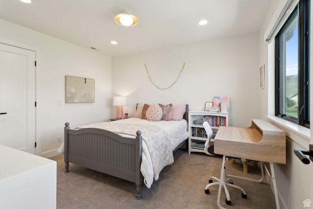 carpeted bedroom featuring recessed lighting