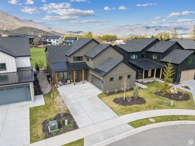 aerial perspective of suburban area featuring a mountainous background