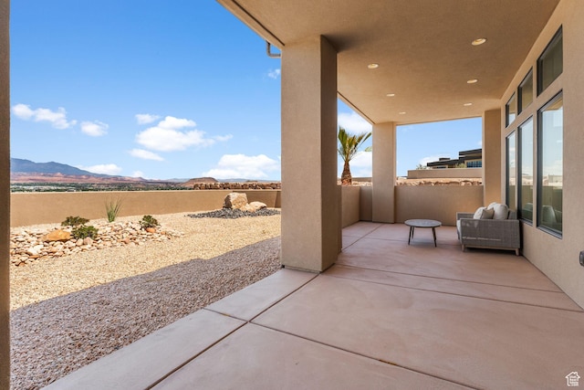 1526 S Shale Dr, St George, UT 84790 - view of patio / terrace with a mountain view and a fenced backyard
