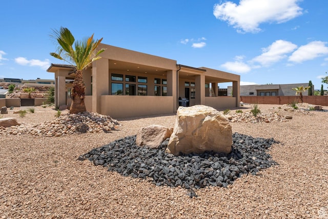 1526 S Shale Dr, St George, UT 84790 - view of front of property with stucco siding and fence