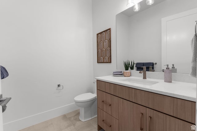 1526 S Shale Dr, St George, UT 84790 - bathroom with vanity, toilet, and baseboards