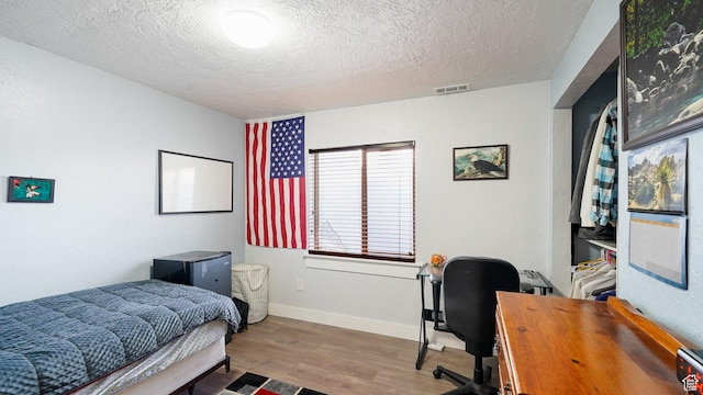 186 W 380 S, American Fork, UT 84003 - bedroom with wood finished floors, a textured ceiling, a desk, and baseboards