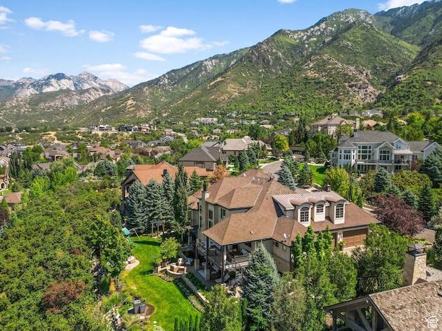 aerial perspective of suburban area with a mountainous background
