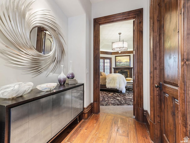 hallway featuring hardwood / wood-style flooring