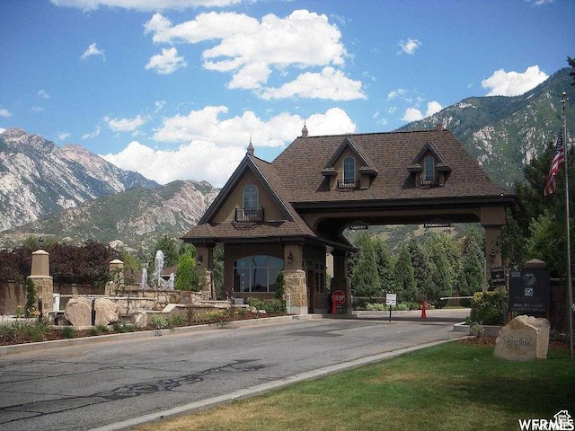 view of front of property with a mountain view