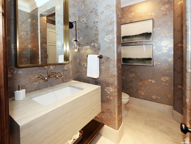 bathroom featuring toilet, baseboards, tile patterned flooring, and vanity