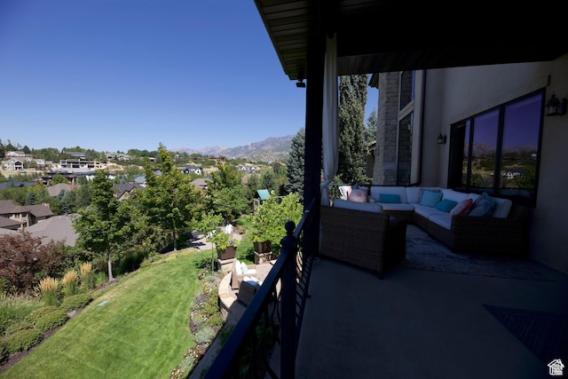 view of patio featuring outdoor lounge area and a mountain view