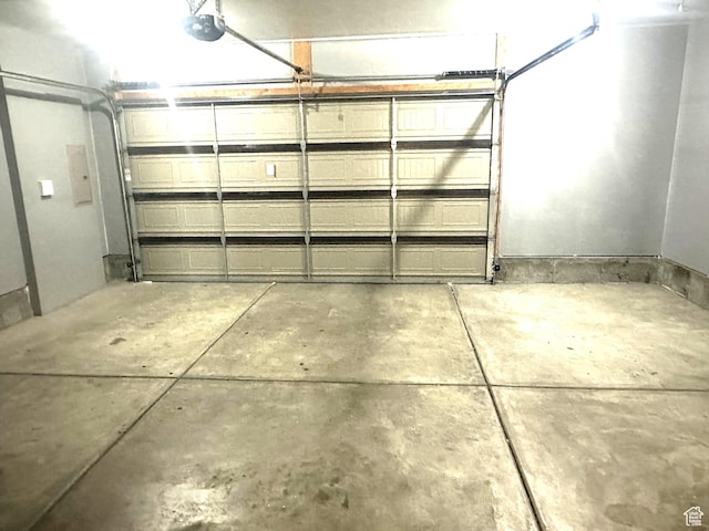 5516 W Florence Ln N, Highland, UT 84003 - garage with electric panel and a garage door opener