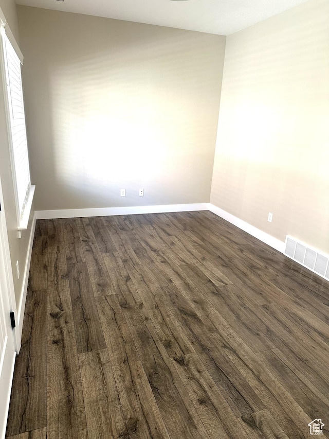 5516 W Florence Ln N, Highland, UT 84003 - empty room with dark wood-style flooring and plenty of natural light