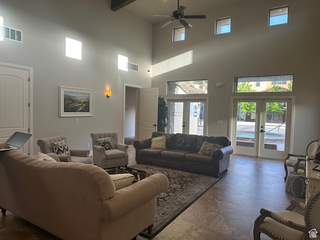 5516 W Florence Ln N, Highland, UT 84003 - living area featuring a towering ceiling, ceiling fan, french doors, and healthy amount of natural light