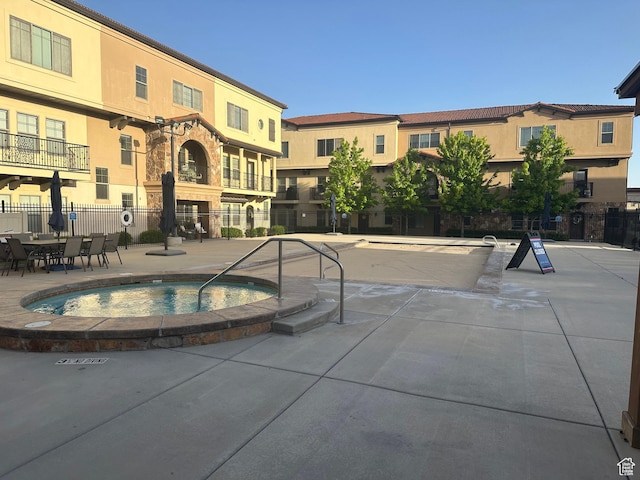 5516 W Florence Ln N, Highland, UT 84003 - view of swimming pool featuring a hot tub