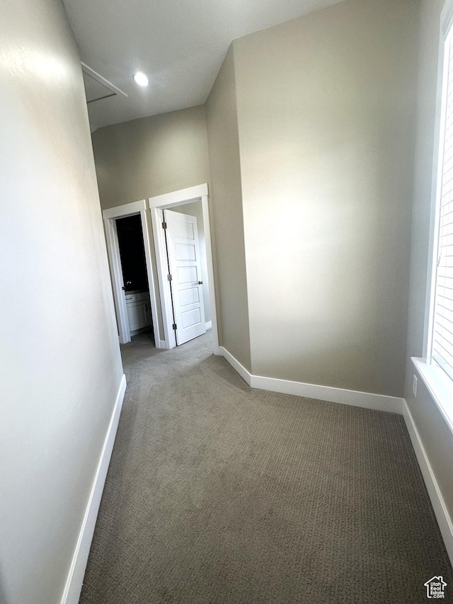 5516 W Florence Ln N, Highland, UT 84003 - carpeted spare room featuring baseboards and attic access
