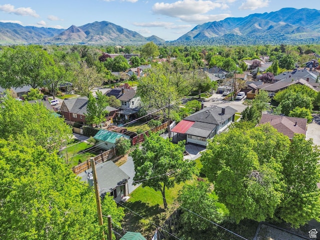 aerial perspective of suburban area featuring a mountain backdrop