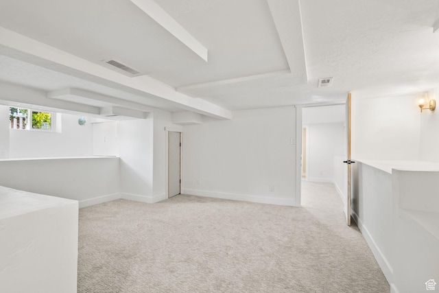 basement with carpet floors and baseboards