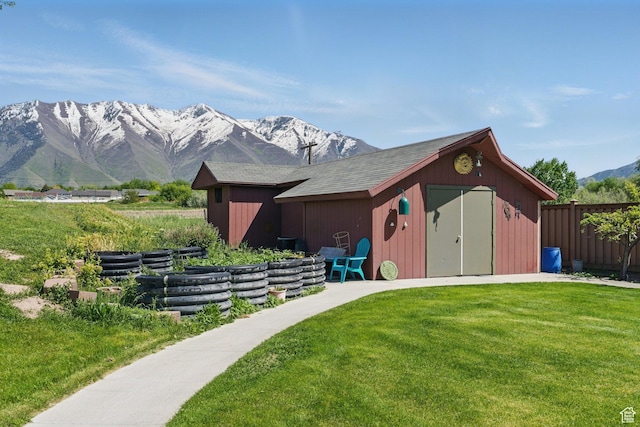 view of shed with a mountain view