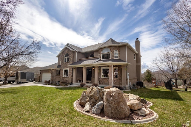 view of front of property featuring a chimney, an attached garage, concrete driveway, a porch, and central AC