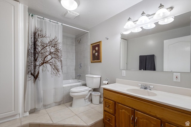 bathroom featuring tile patterned floors, shower / bathtub combination with curtain, vanity, and toilet