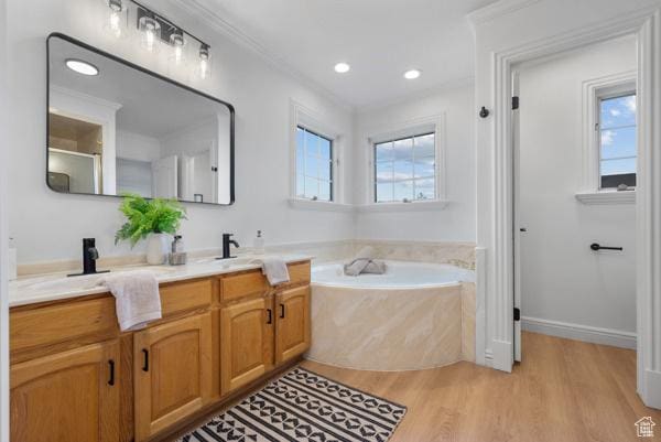 441 N Palisades Dr, Orem, UT 84097 - bathroom featuring wood finished floors, double vanity, a bath, and crown molding