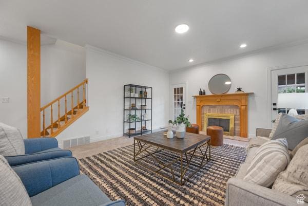 441 N Palisades Dr, Orem, UT 84097 - living area featuring stairway, crown molding, recessed lighting, a fireplace, and carpet flooring