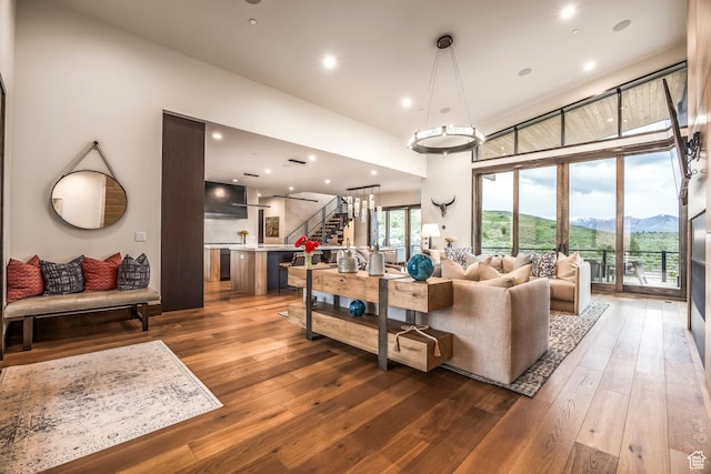 6110 E Blue Wing Loop, Kamas, UT 84036 - living room featuring stairs, hardwood / wood-style flooring, and recessed lighting