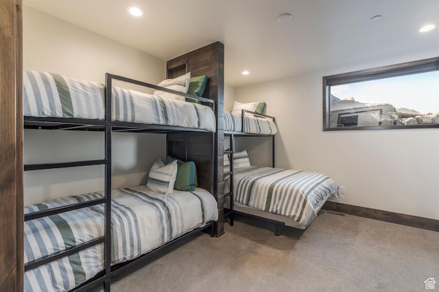 carpeted bedroom with recessed lighting and baseboards