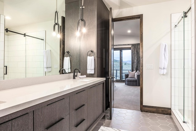 6110 E Blue Wing Loop, Kamas, UT 84036 - bathroom featuring tile patterned floors, a stall shower, double vanity, recessed lighting, and ensuite bath