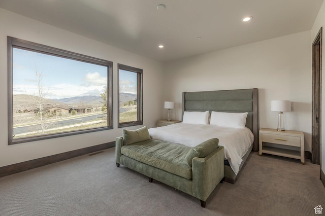 carpeted bedroom with recessed lighting and baseboards