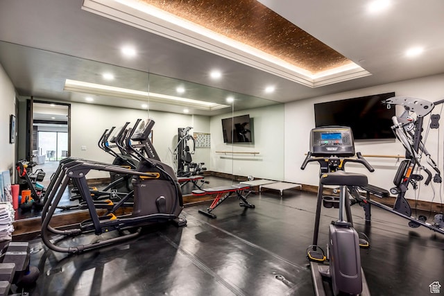 6110 E Blue Wing Loop, Kamas, UT 84036 - gym featuring a tray ceiling and baseboards