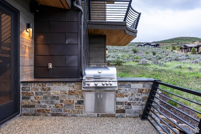 6110 E Blue Wing Loop, Kamas, UT 84036 - view of patio / terrace with grilling area and a balcony
