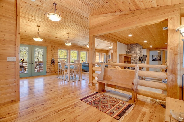 9174 Deer Creek Dr, Heber City, UT 84032 - living room featuring french doors, wooden ceiling, wood finished floors, and log walls