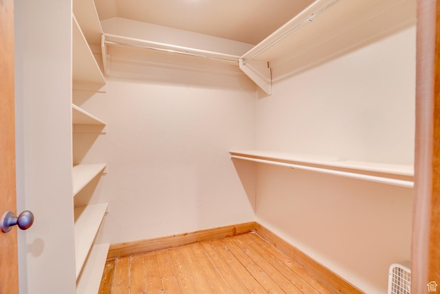 9174 Deer Creek Dr, Heber City, UT 84032 - walk in closet with wood-type flooring
