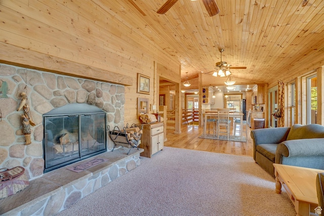 9174 Deer Creek Dr, Heber City, UT 84032 - carpeted living room featuring a ceiling fan, wooden ceiling, lofted ceiling, and a fireplace
